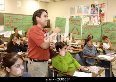 Brownsville, Texas USA, December 2, 2005: Veteran teacher lectures students in algebra class at Lopez High School, where the student population more than 99% Hispanic. ©Bob Daemmrich Stock Photo