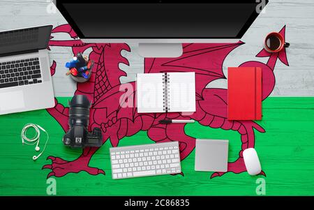 Wales Computer Wales flag background with headphone,computer keyboard and mouse on ...