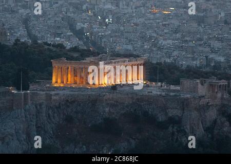 Sunset in Athens, view from Lycabettus Mountain with the Acropolis and the Parthenon at twilight. Greece