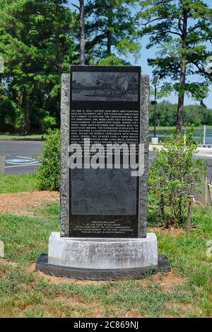 A granite marker commemorating Captain John Smith's 1608 exploration of the Chesapeake bay and its tributaries stands at Phillips Landing in Delaware. Stock Photo