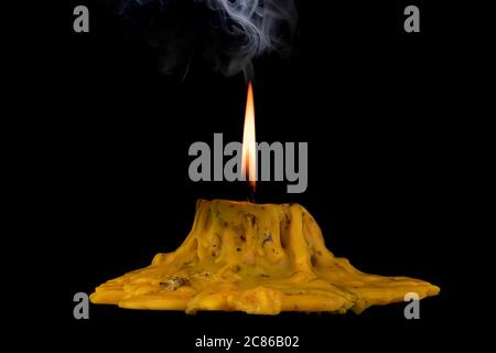 light flame candle burning brightly on black background Stock Photo