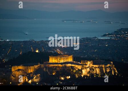 Sunset in Athens, view from Lycabettus Mountain with the Acropolis and the Parthenon at twilight. Greece