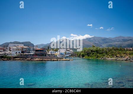 View of the port of the traditional seaside village of Sisi in Crete Stock Photo