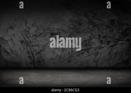 Grunge cracked concrete black wall, Old brick wall with peeling plaster. black wall cement background for product show with Elegant light. background Stock Photo