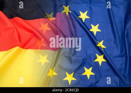 EU or European Union and German flags, concept Stock Photo