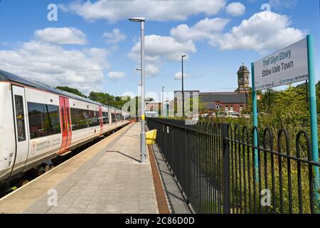 Ebbw Vale, Wales - July 2020: Passenger train alongside the platform at Ebbw Vale town station. The train is in the new colours of Transport for Wales Stock Photo