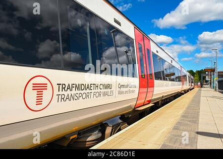 Ebbw Vale, Wales - July 2020: Passenger train alongside the platform at Ebbw Vale town station. The train is in the new colours of Transport for Wales Stock Photo