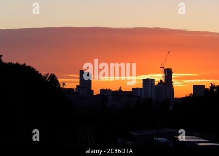 Sunrise with Yorkshire's newest tallest building 'Altus House' in Leeds City Centre. Stock Photo