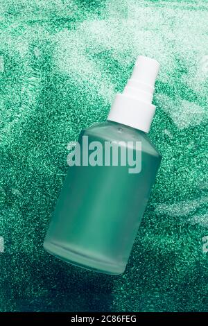 Download Blue Transparent Spray Bottle With Drops On A White Background Stock Photo Alamy PSD Mockup Templates