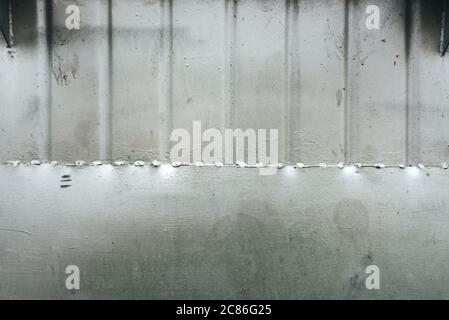 Corrugated steel metal background, weathered metallic surface pattern Stock Photo