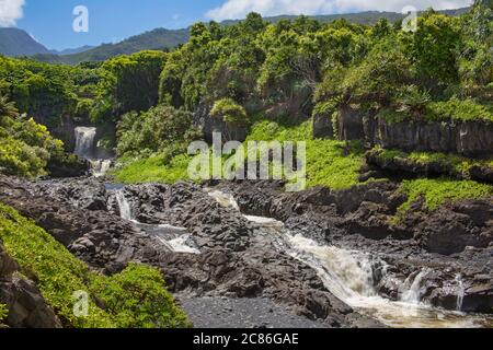 Oheo Gulch in Kipahulu is located in Haleakala National Park and often incorrectly referred to as Seven Sacred Pools, Maui, Hawaii. Stock Photo