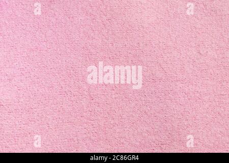 Pastel pink knitted woolen fabric texture background Stock Photo