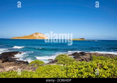 Manana Island and Kaohikaipu Island located at Makapu'u Point off the eastern end of O'ahu, Hawaii, are both seabird sanctuaries also known as Rabbit Stock Photo