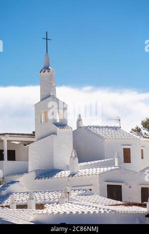 Traditional whitewash bell tower in the fishing village of Binibeca Vell, Menorca Stock Photo
