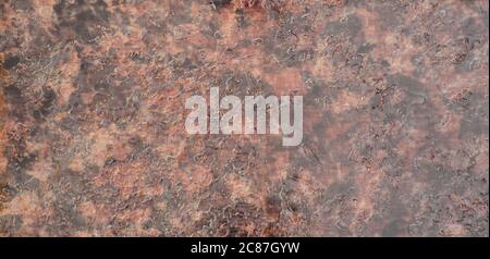 Dark brown granite, rough surface of roughly cut stone close-up. Background, texture. Stock Photo