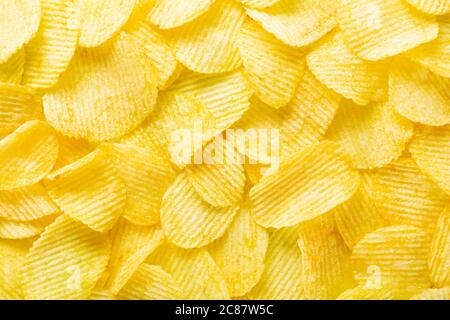 background corrugated golden chips with texture Stock Photo
