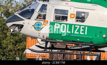 Magdeburg, Germany. 22nd July, 2020. The accused Stephan Balliet (r) is sitting in a police helicopter on his way to the regional court. The Federal Prosecutor's Office accuses the assassin of Hall 13 of criminal offences, including murder and attempted murder. On 9 October 2019, on the highest Jewish holiday Yom Kippur, he had attempted to cause a bloodbath in the synagogue in Halle. Credit: Jan Woitas/dpa-Zentralbild/dpa/Alamy Live News Stock Photo