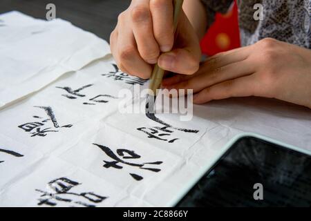 A calligrapher is creating calligraphy and writing calligraphy Stock Photo