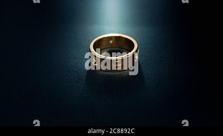 wedding rings on black background Stock Photo