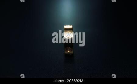 wedding rings on black background Stock Photo