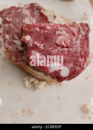 Pane e salame , bread and salami, tipical break appetizer from northern Italy Stock Photo