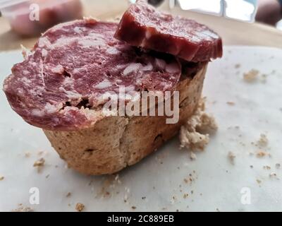 Pane e salame , bread and salami, tipical break appetizer from northern Italy Stock Photo