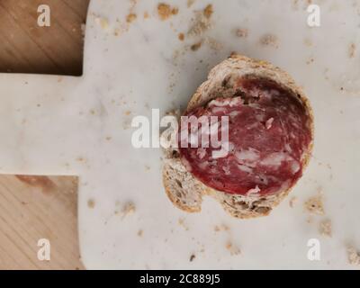 Pane e salame , bread and salami, tipical break appetizer from northern Italy Stock Photo