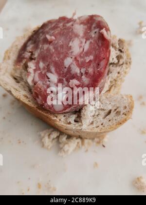 Pane e salame , bread and salami, tipical break appetizer from northern Italy Stock Photo