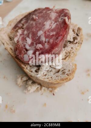 Pane e salame , bread and salami, tipical break appetizer from northern Italy Stock Photo