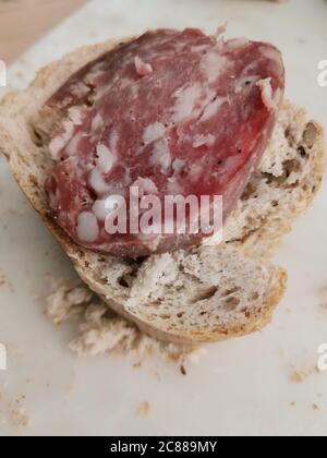 Pane e salame , bread and salami, tipical break appetizer from northern Italy Stock Photo