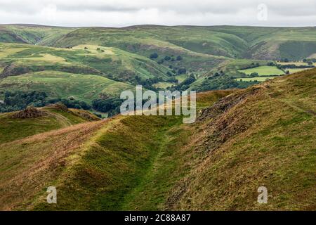 View towards the Long Mynd from the ramparts of the prehistoric hill fort at Caer Caradoc, near Church Stretton, Shropshire Stock Photo