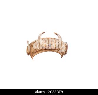 Kachin or Jingpo traditional rattan hat with tusks of a wild boar, isolated on white background with clipping path. Straight front view. Stock Photo