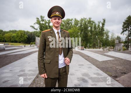 Minsk / Belarus - June 5, 2019: young freshmen from military school celebrate graduation party in park wearing uniforms Stock Photo