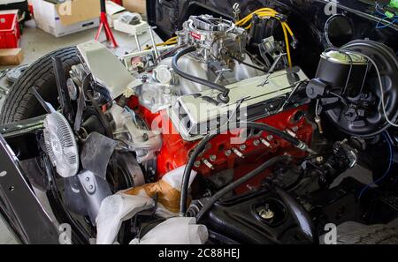 Photo of a Edelbrock carburetor on a newly restored V8 engine. Stock Photo