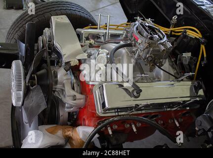 Photo of a Edelbrock carburetor on a newly restored V8 engine. Stock Photo