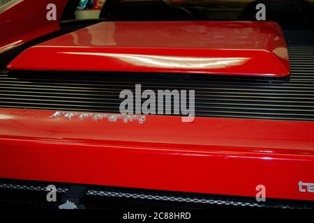 An engine compartment cover from a red super sports car from Italy. Ferrari Testarossa. Stock Photo