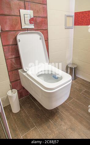 A variant of the arrangement of objects and furniture in the toilet. Toilet room interior. Stock Photo