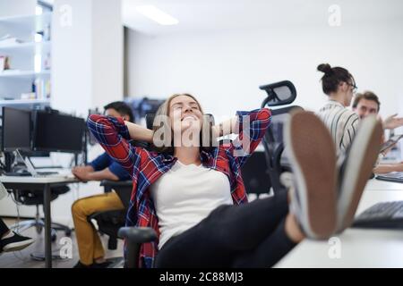 Woman legs on computer keyboard in office Stock Photo - Alamy