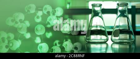 two glass science flask in dark green biotechnology laboratory with chemical molecular structure banner background Stock Photo