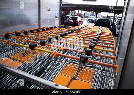 Area where the shopping carts of a shopping center are kept lined up Stock Photo