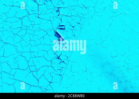 Fragment of colored graffiti painted on a stone wall. Abstract background for design. Old peeling paint. Stock Photo