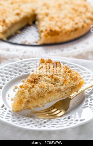 Piece of homemade delicious apple pie on white plate Stock Photo