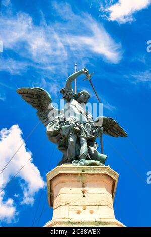 Rome, Italy - April 30, 2019 - Bronze statue of Michael the Archangel, standing on top of the Castel Sant'Angelo, modelled in 1753 by Peter Anton von Stock Photo