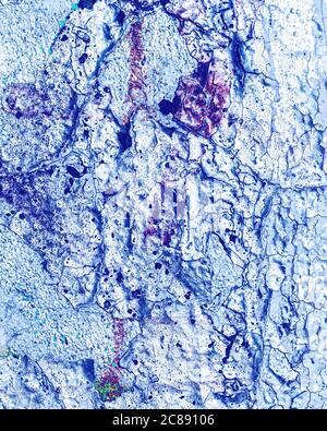 Fragment of colorful graffiti painted on a wall. Bright abstract background for design with peeling paint. Stock Photo