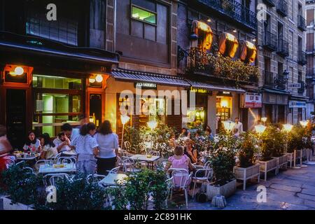 Restaurante Los Galayos and Arcos bar along Calle de botoneras. Plaza Mayor, Madrid, Spain. Circa 1990 Stock Photo