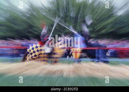 Two horsemen wielding lances with blunted tips, Jousting, England, UK Stock Photo