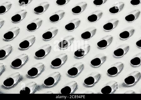 close up of metallic grater, abstract background Stock Photo