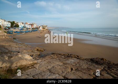 The beach at Taghazout on the Atlantic coast of Morocco Stock Photo