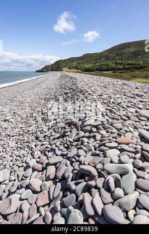 The  shingle and pebble barrier ridge of Bossington Beach looking towards Hurlstone Point on the coast of  Exmoor National Park, Somerset UK Stock Photo