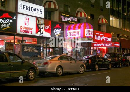 Fastfood restaurants side by side in New York USA Stock Photo